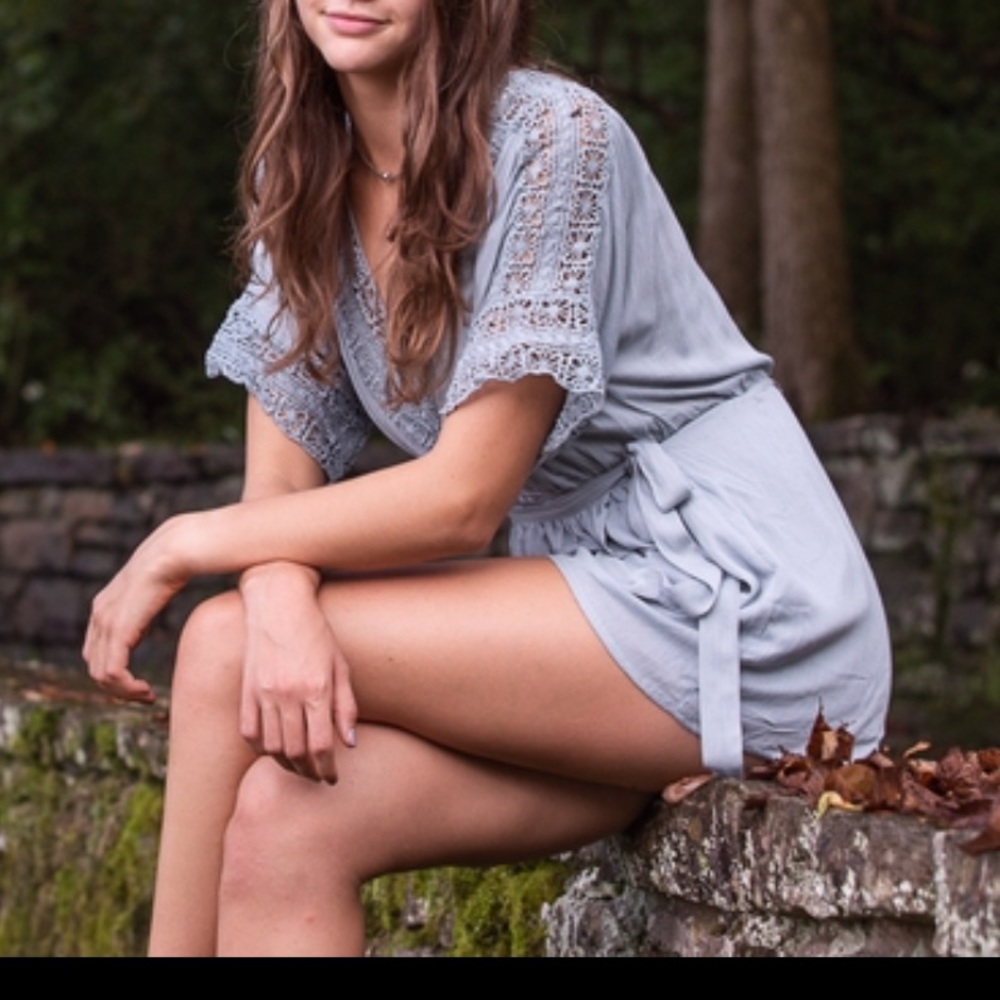 Blue v-neck romper with lace